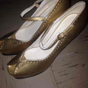 Gold peep toe pumps